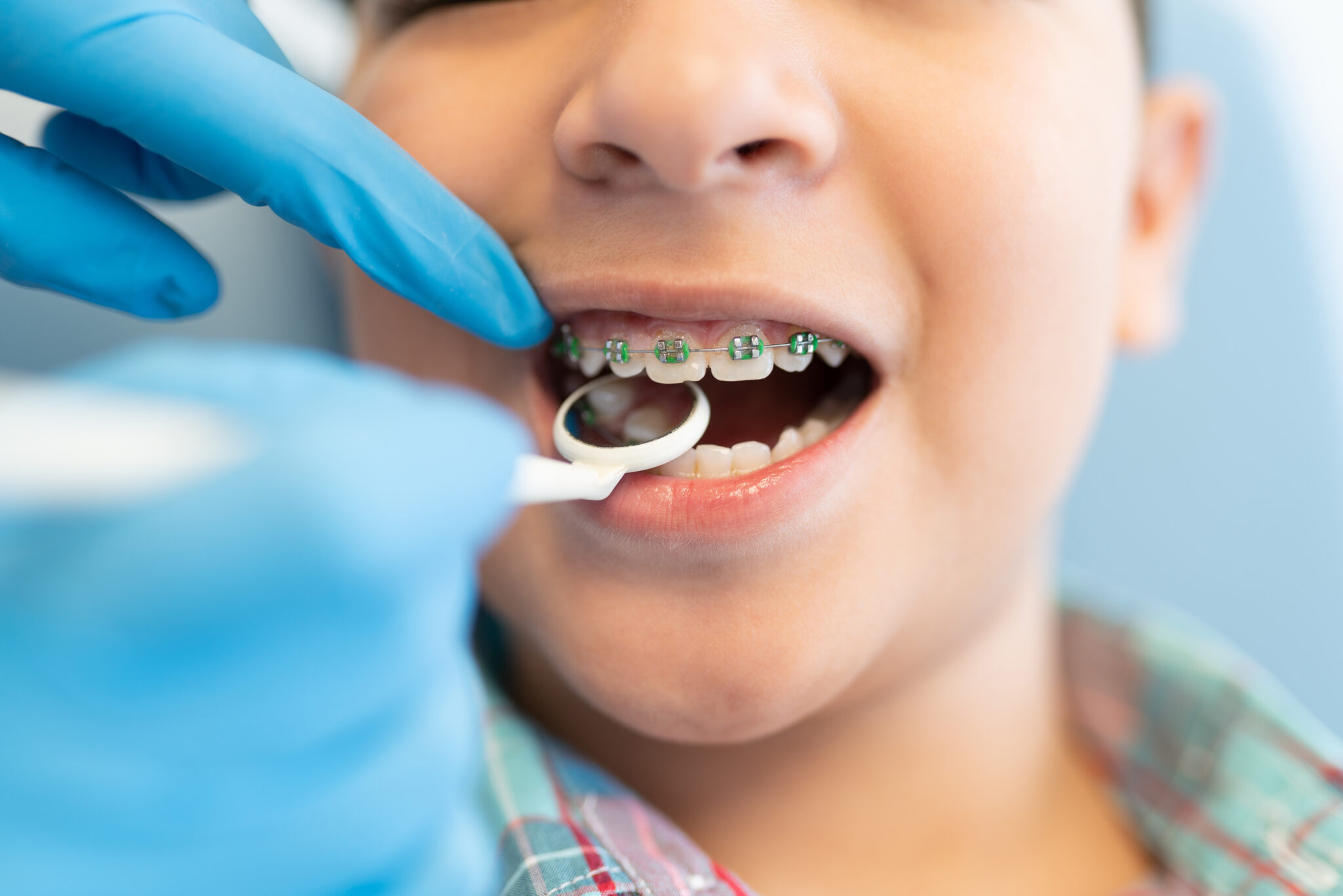 young child getting braces
